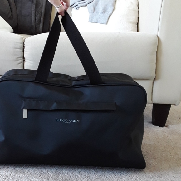 Giorgio Armani Handbags - Giorgi Armani parfums black duffle bag